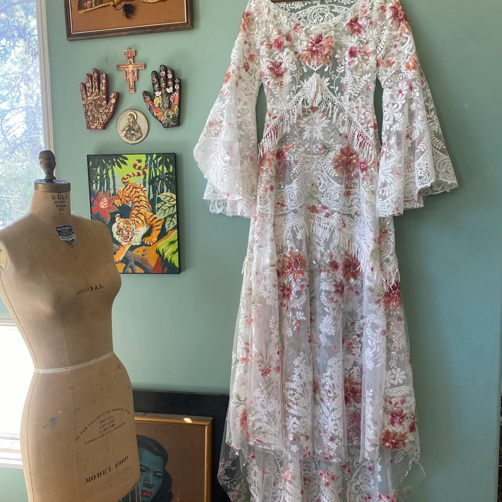 Custom wedding dress with floral lace and fringe
